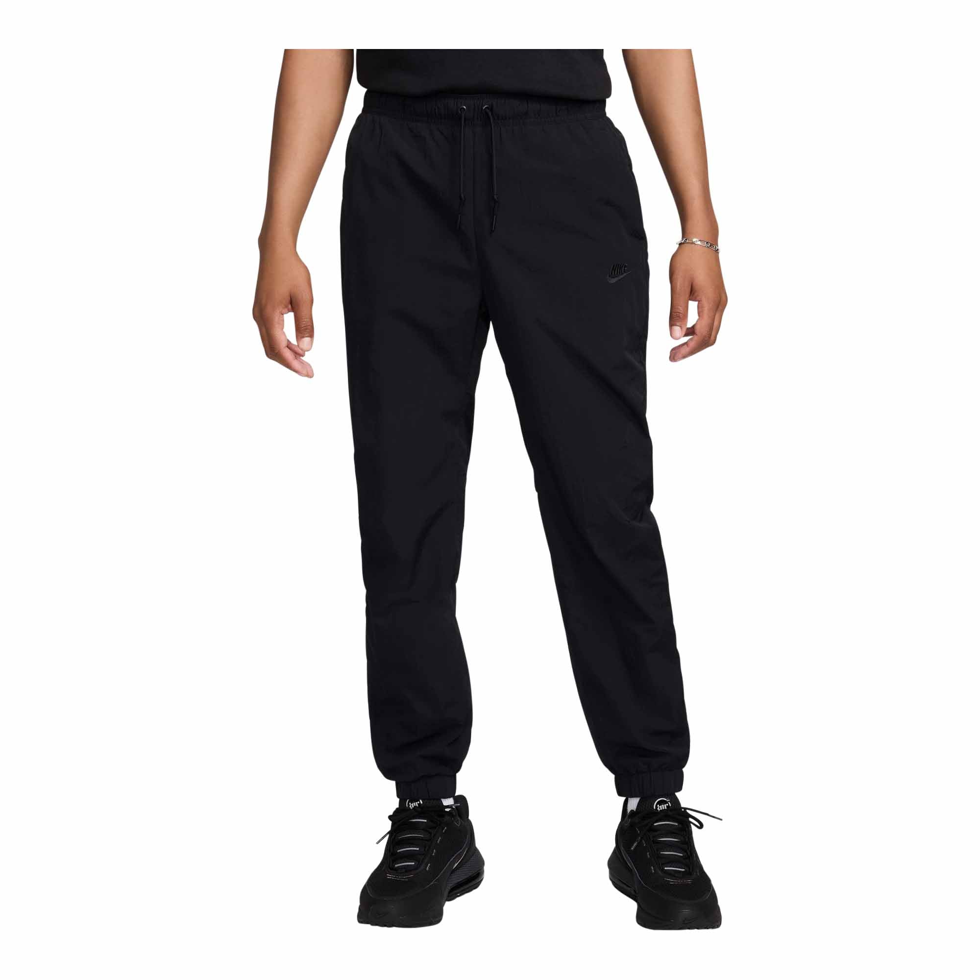 Shop Nike Tech Men's Woven Taper Leg Pants Millennium Shoes